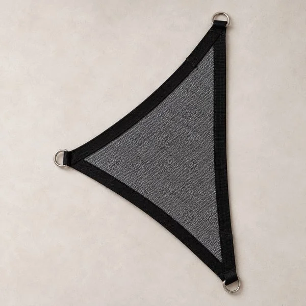 Triangle shade sail, charcoal, laid flat with stainless D-rings